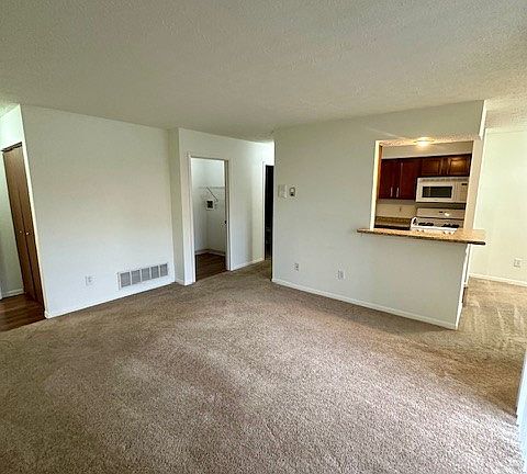 Living room- Entry on far left- laundry is the second left
