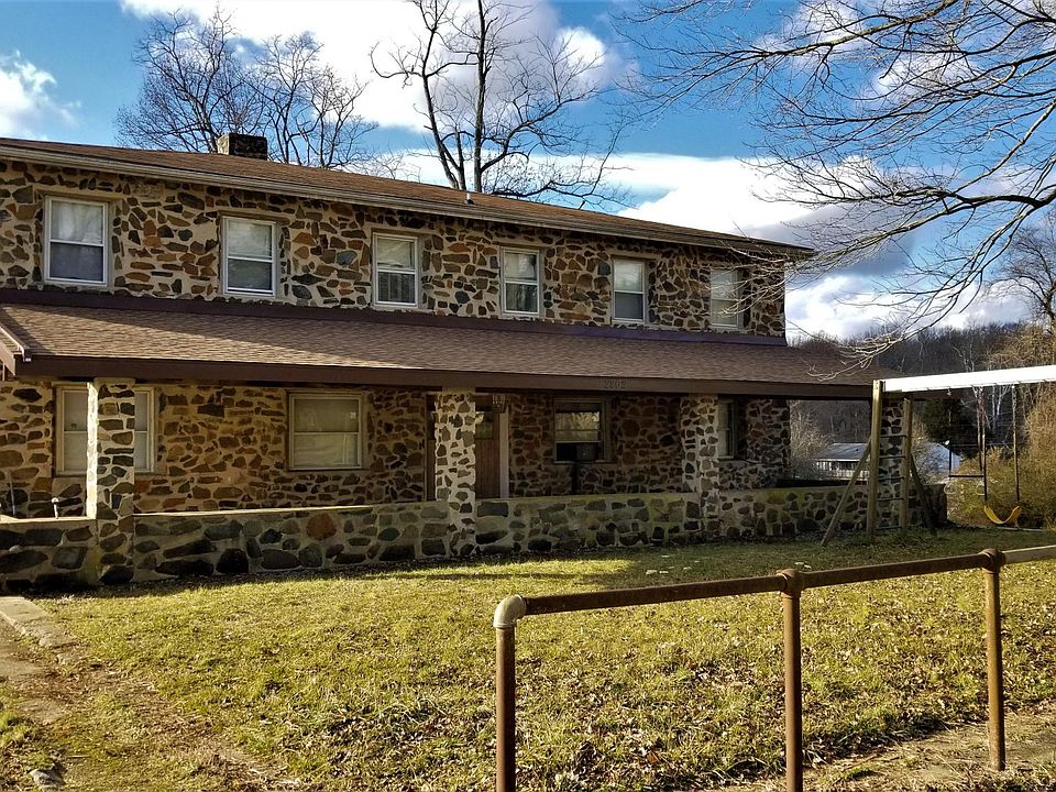 The entrance for this unit is on the left side of the home.