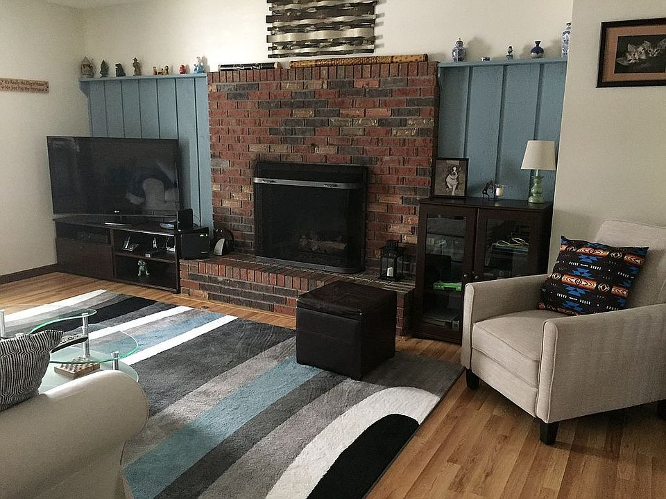 Den with ga fireplace