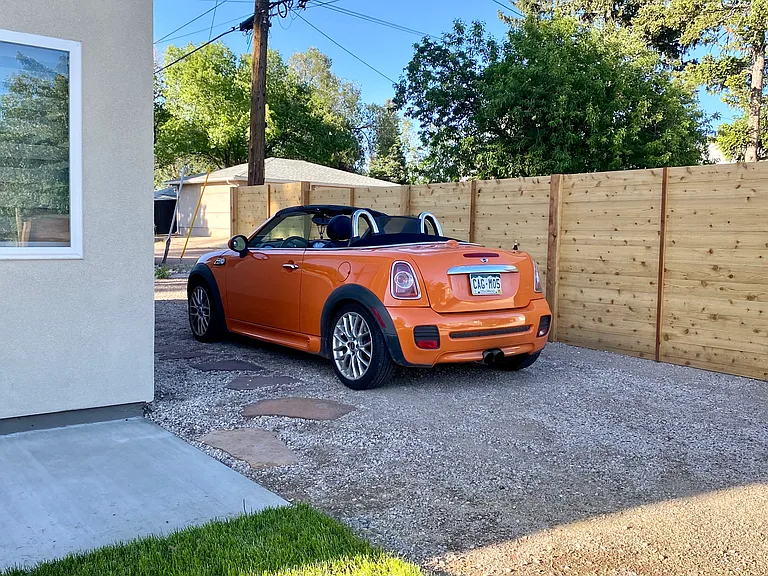 Free off-street parking with privacy fence.