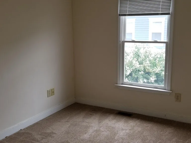 The left upper bedroom after final cleaning.