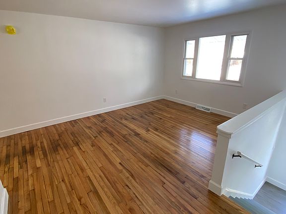 Living room with refinished Hardwood floors