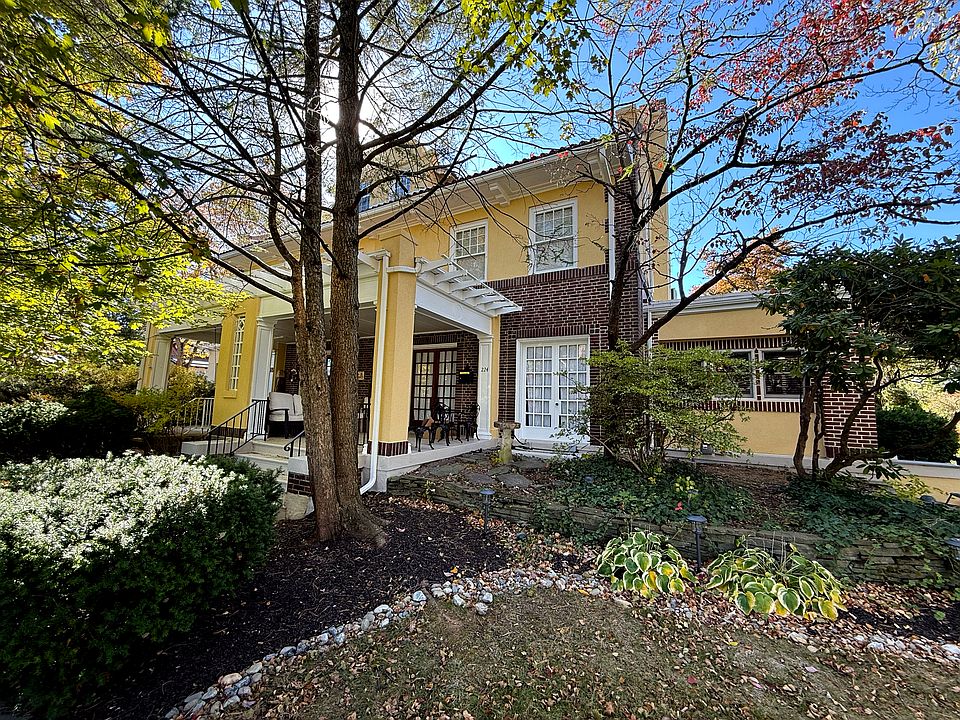 Set on a beautiful tree-lined street with mature plantings and brand new landscaping.