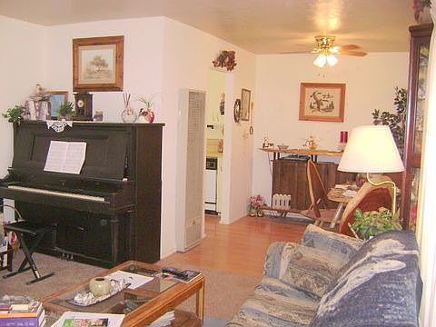 Living Area, newer carpet & hardwood floors