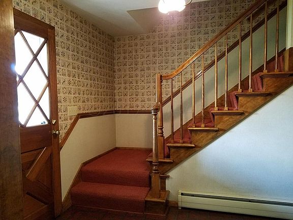 Entrance and Stairway to Upstairs