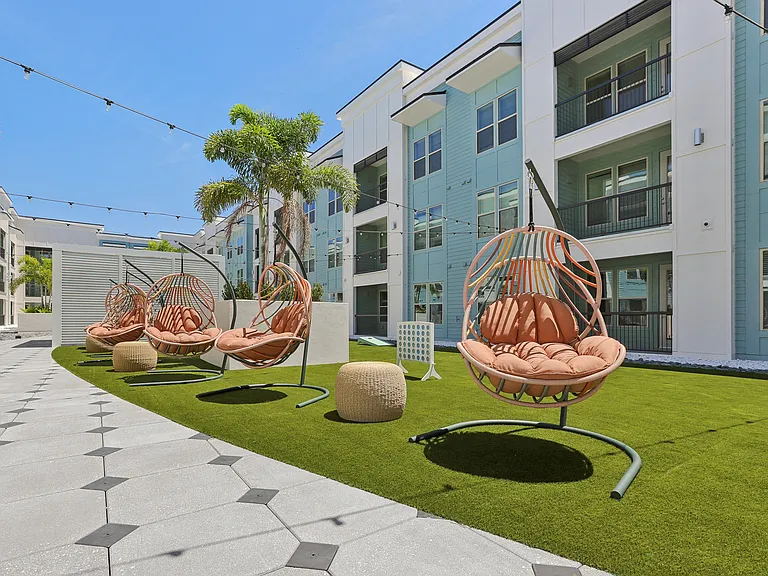 Social Deck with Grilling Stations, TVs, Cabanas, and Bocce Ball