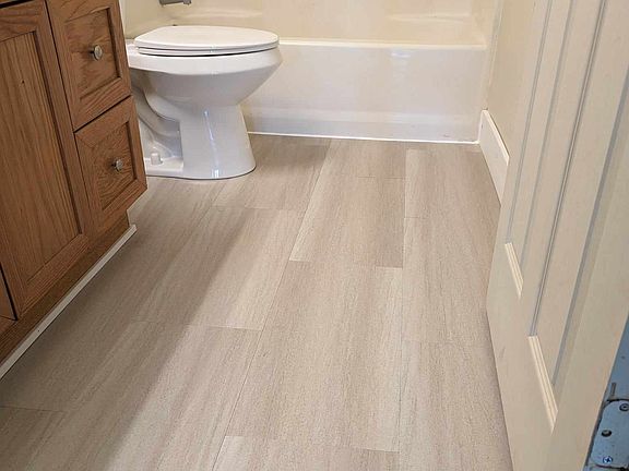 New bathroom flooring and Toilet