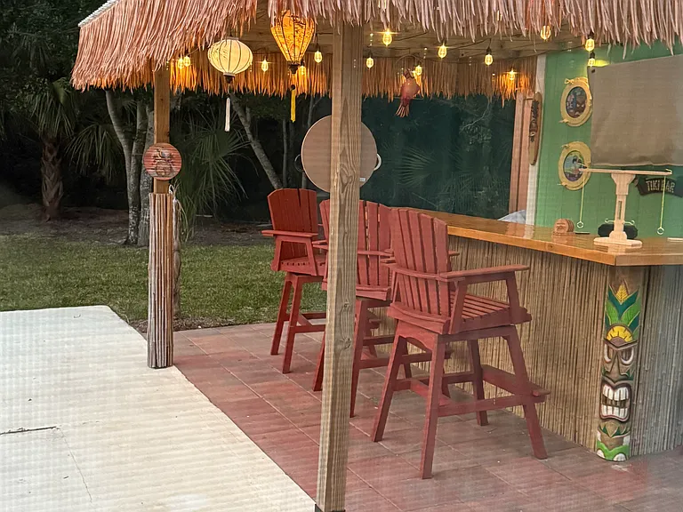 Outside Tiki bar with TV