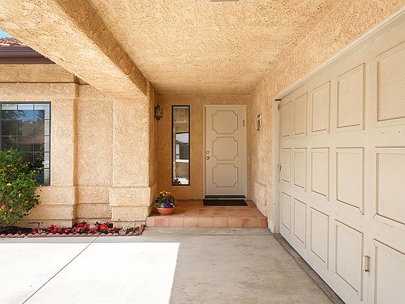 Covered entrance &  garage