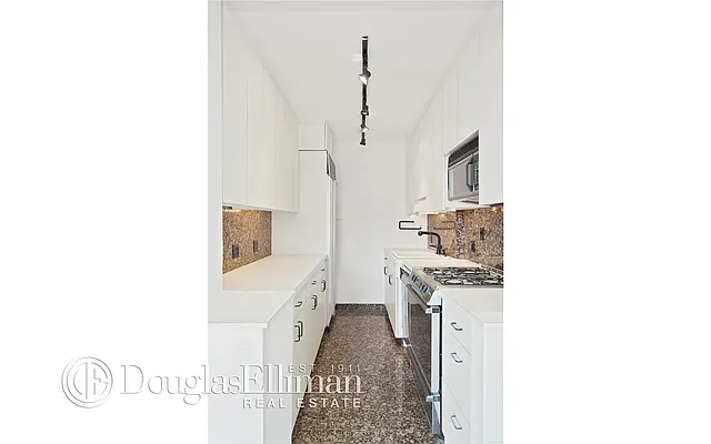 Sold by Douglas Elliman | media 13