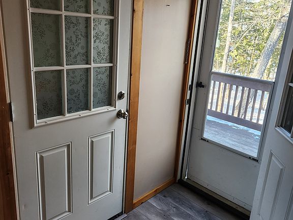 Main entrance ahead, plus 2nd door of second egress on left.