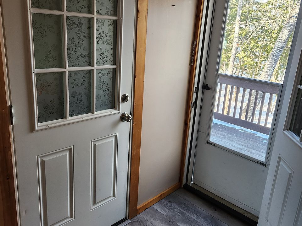 Main entrance ahead, plus 2nd door of second egress on left.