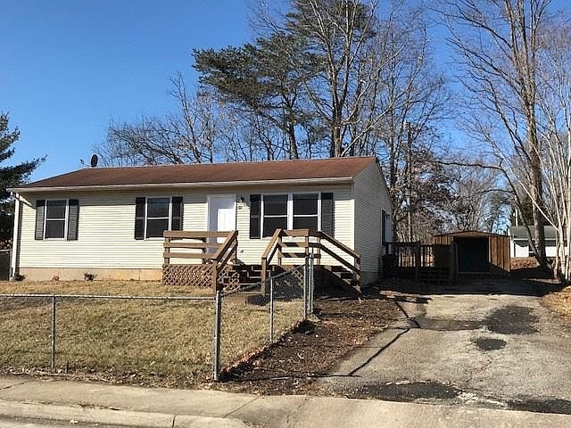 Front Updated Stain on Deck and Side Porch Landing