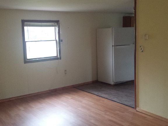 open floor plan window facing lake