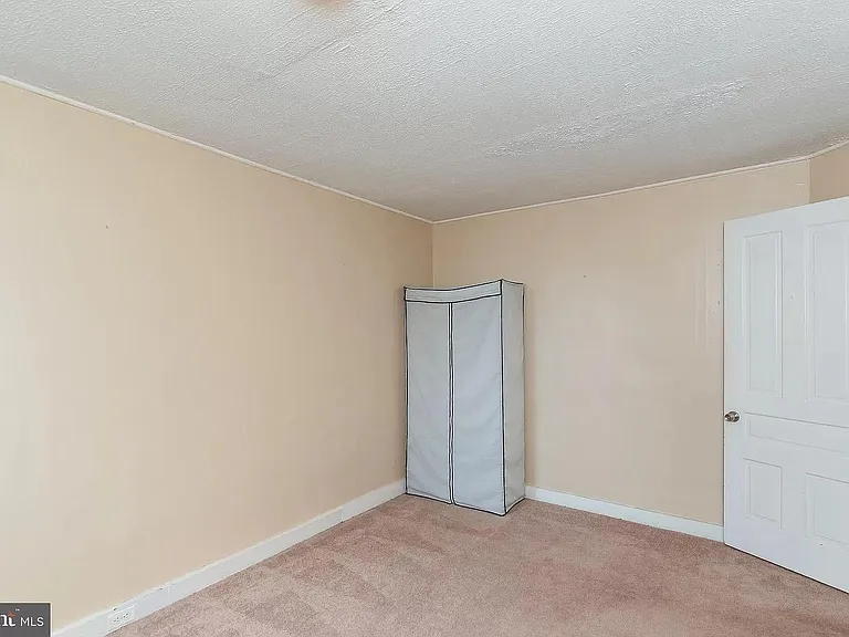 2nd bedroom, now with newly built-in closet and fresh paint