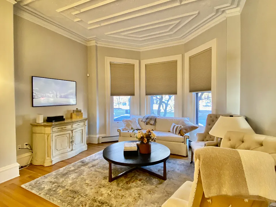Living room with views to Commonwealth Ave. Mall