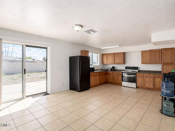 5th image of 6727 W ROMA Avenue