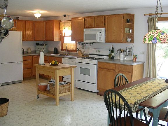 23 foot Kitchen with sliders to back deck