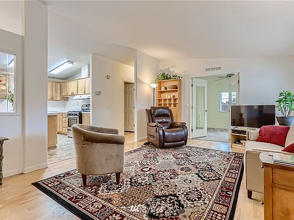 living room w/open view of kitchen