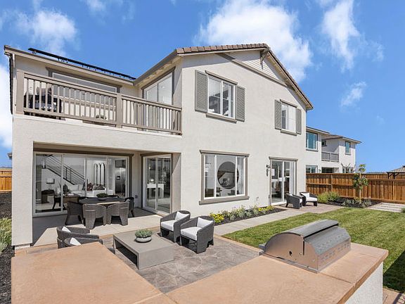 Large backyard with covered patio space