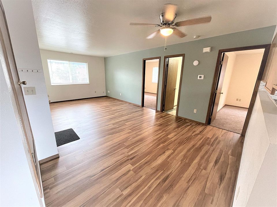 Spacious living and dining room with luxury vinyl tile