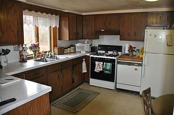 The eat in kitchen is a great place for gathering.  It has plenty of cabinets and counter space.  Perfect for the chef in the family to do their thing.  The appliances in the kitchen that will stay include the electric range and the dishwasher.