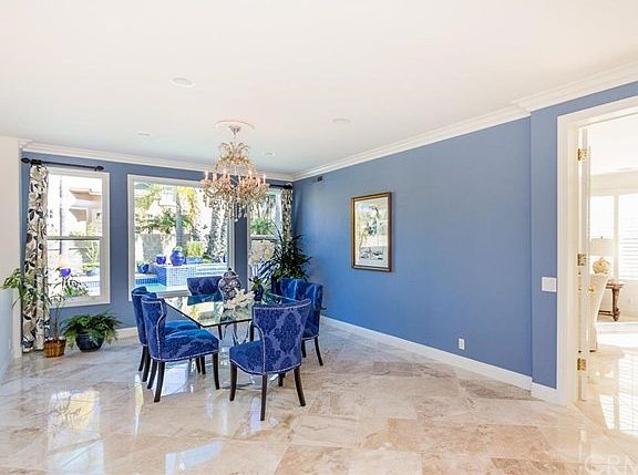 Formal Dining Room with view of pool/waterfall & backyard