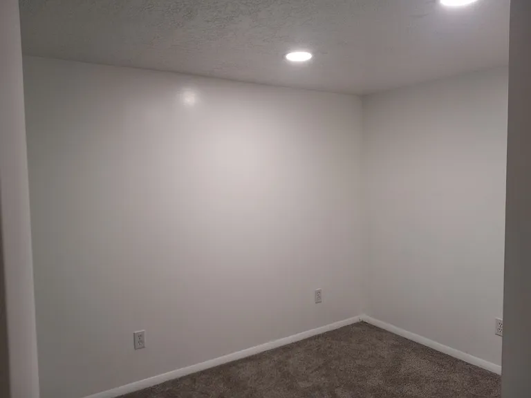 Cozy den, office or workout room. View from hallway.