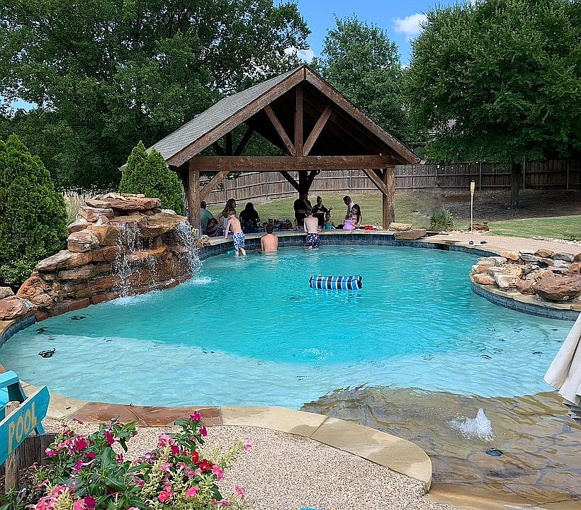 Pool with swim up bar
