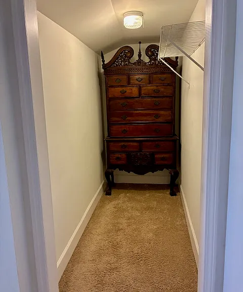 Bedroom 1 closet with dresser