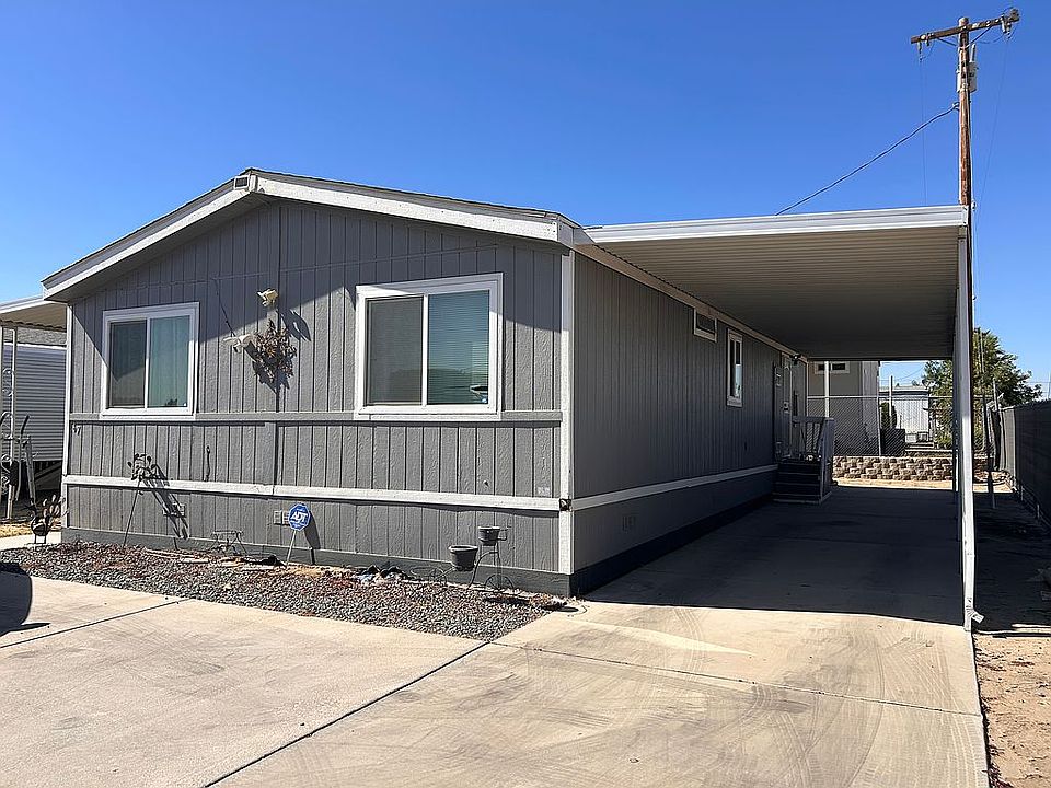 Large carport and driveway
