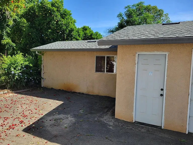 Side Door Entrance to Garage and Bonus Room