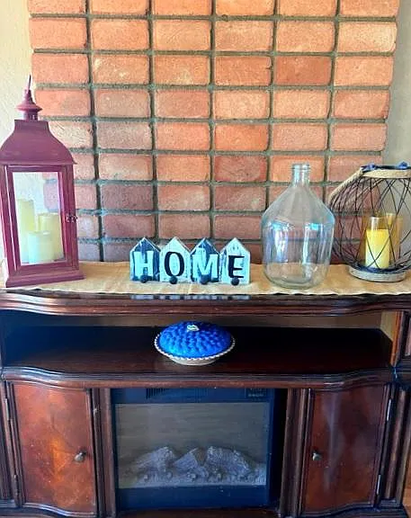Charming Electric Fireplace included