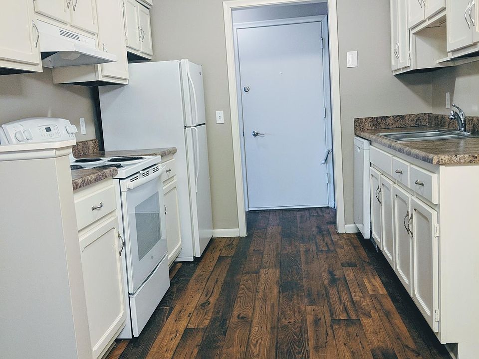 Large walk through kitchen with plenty of counterspace