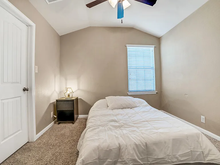Additional upstairs guest bedroom (#4) with walk-in closet