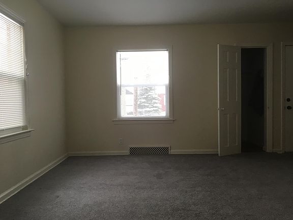 living rm with walk-in coat closet