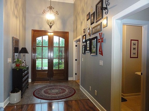 Tiled Entry and Double Doors