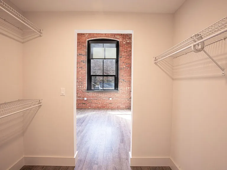 Oversized walk-in closets with built in shelving