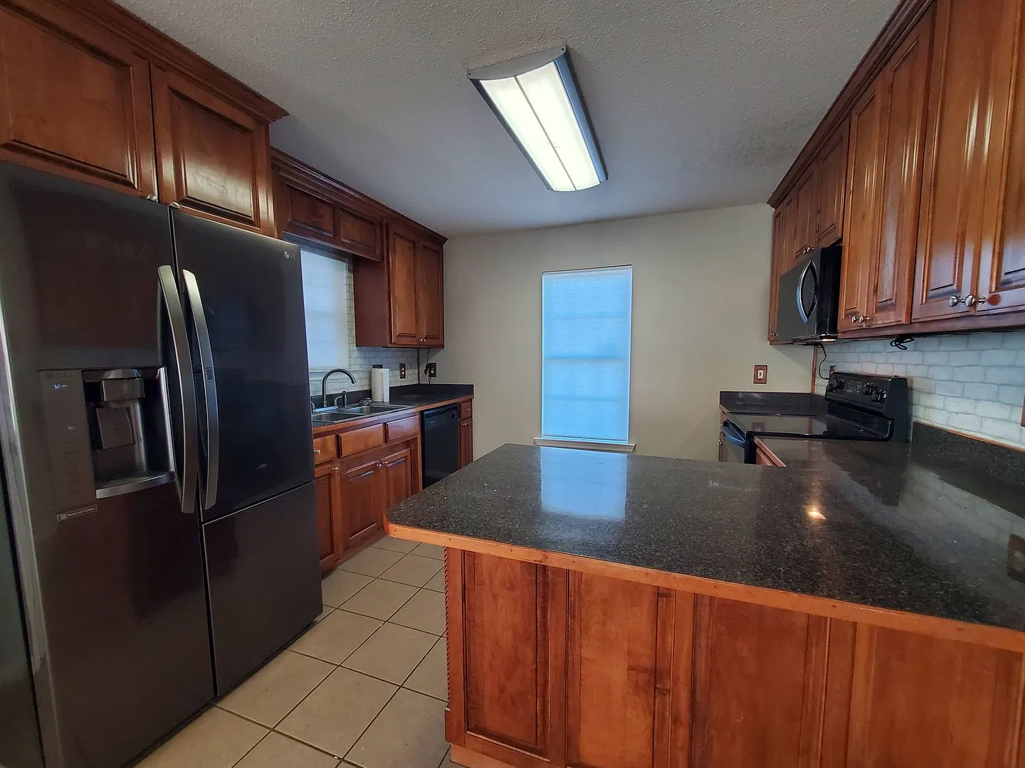 Charming 3-Bedroom Home with Wrap-Around Porch and Spacious Backyard! — Photo 4