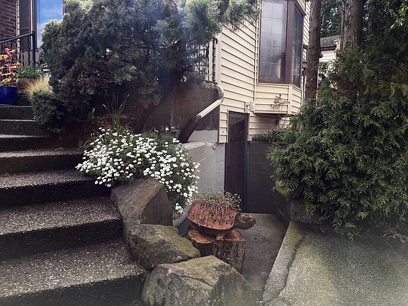 Separate entrance front door. There is a back door off the bedroom Not pictured.
