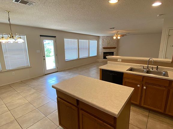 Kitchen with full wall of windows across the back wall