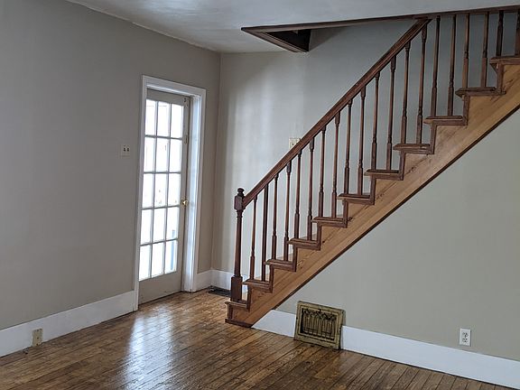 Living Room with Stairs to Upper Level