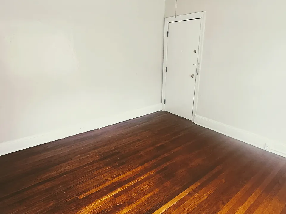 Living room with apartment front door