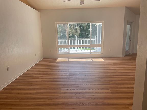 View when entering. Showcases the living room.