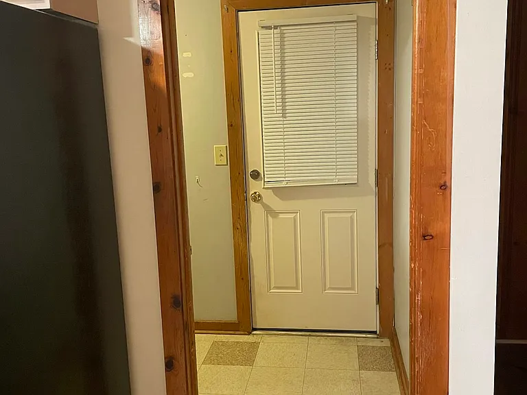 Backdoor to the fenced in yard