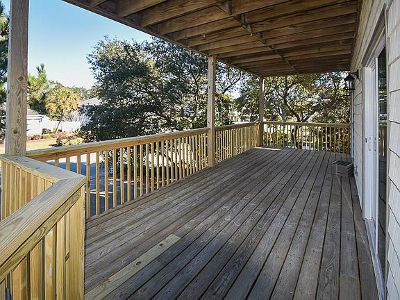 Huge covered deck off the living room.