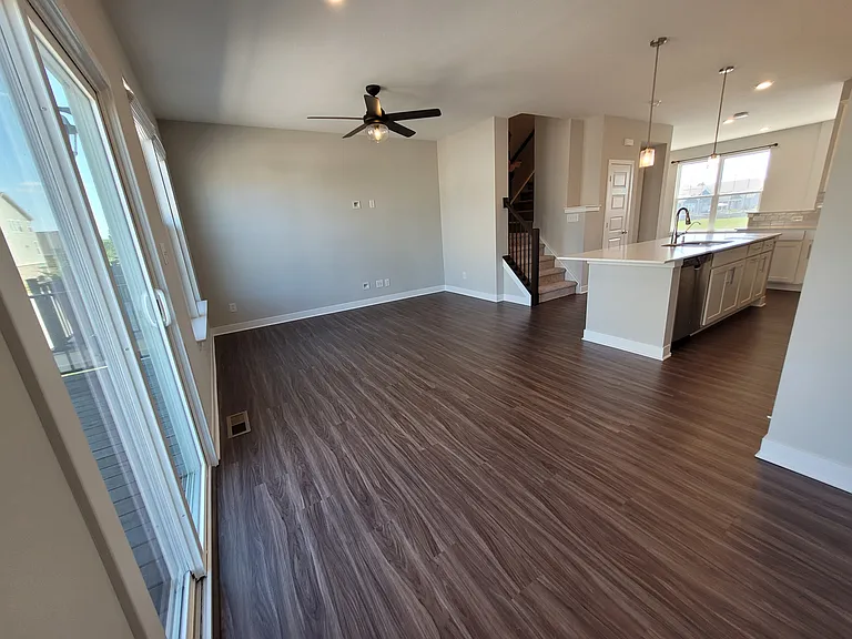 The kitchen opens to the living space