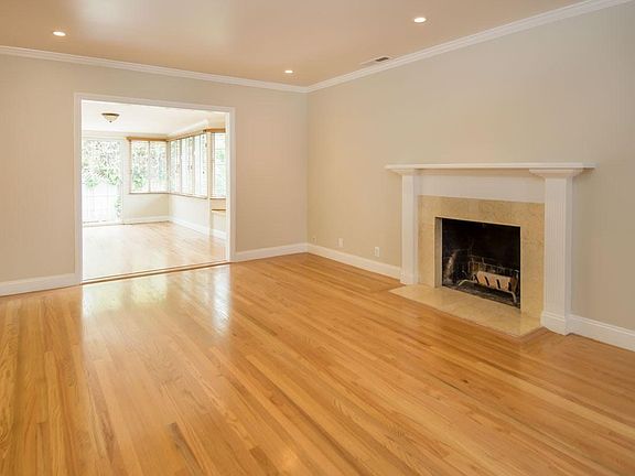Living room with wood-burning fireplace