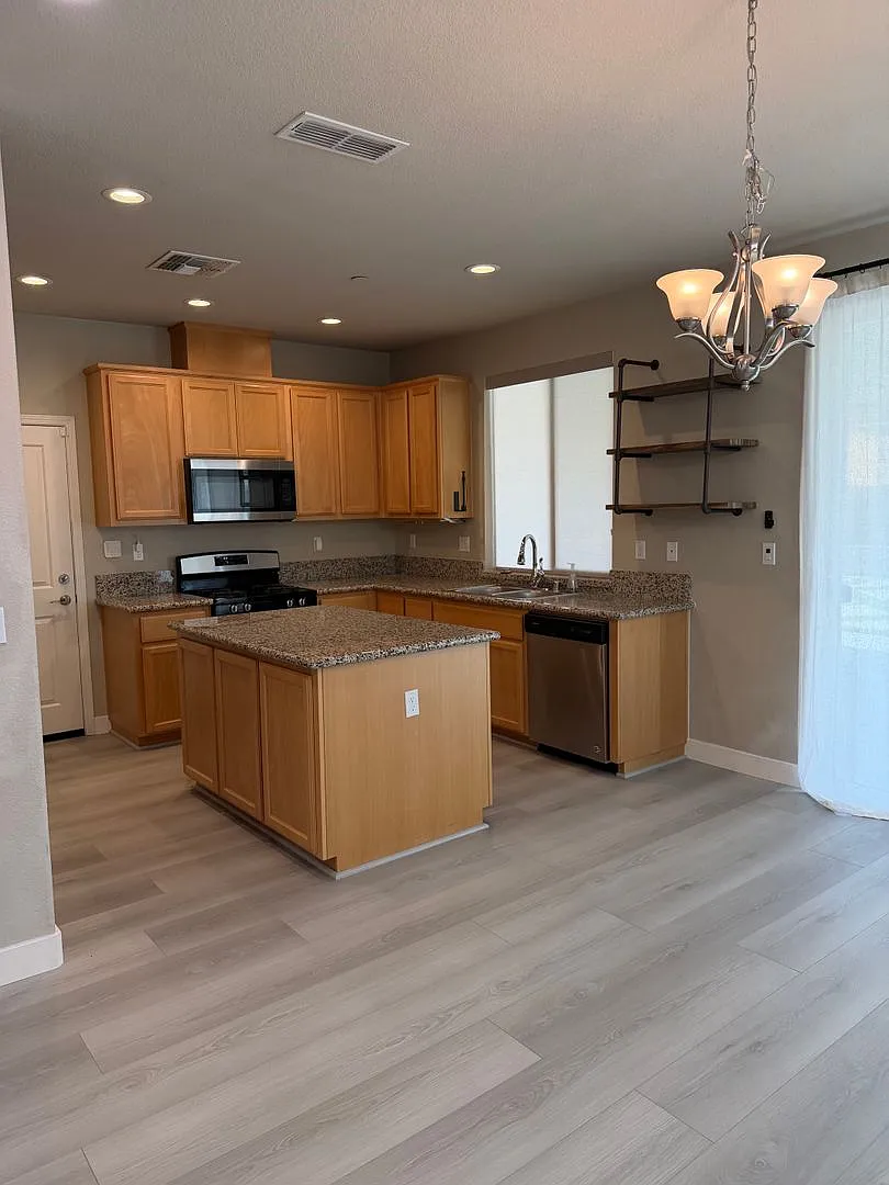 **Modern 3-Bedroom Home with 2-Car Garage & Included Appliances** — Photo 4