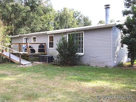 Wood deck at back entry